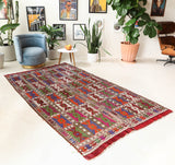 Vintage kilim rug in living room setting, bright colors, wild shaman, soft rug, bold color, Portland, Oregon, rug store, rug shop, local shop, vintage rug, modern kilim, warm colors