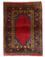 Vintage Turkish rug in a living room setting, pile rug, Turkish rug, vintage rug, portland, rug shop, bright colors, wild shaman, soft rug, bold color, Portland, Oregon, rug store, rug shop, local shop, antique rug