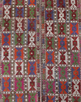 Vintage kilim rug in living room setting, bright colors, wild shaman, soft rug, bold color, Portland, Oregon, rug store, rug shop, local shop, vintage rug, modern kilim, warm colors