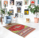 Vintage kilim rug in living room setting, bright colors, wild shaman, soft rug, bold color, Portland, Oregon, rug store, rug shop, local shop, vintage rug, modern kilim, warm colors