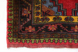 Vintage Turkish rug in a living room setting, pile rug, Turkish rug, vintage rug, portland, rug shop, bright colors, wild shaman, soft rug, bold color, Portland, Oregon, rug store, rug shop, local shop, antique rug