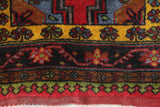 Vintage Turkish rug in a living room setting, pile rug, Turkish rug, vintage rug, portland, rug shop, bright colors, wild shaman, soft rug, bold color, Portland, Oregon, rug store, rug shop, local shop, antique rug