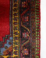 Vintage Turkish rug in a living room setting, pile rug, Turkish rug, vintage rug, portland, rug shop, bright colors, wild shaman, soft rug, bold color, Portland, Oregon, rug store, rug shop, local shop, antique rug