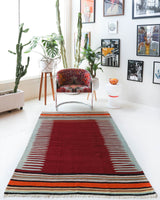 Vintage kilim rug in living room setting, bright colors, wild shaman, soft rug, bold color, Portland, Oregon, rug store, rug shop, local shop, vintage rug, modern kilim, warm colors