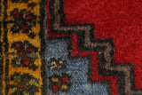 Vintage Turkish rug in a living room setting, pile rug, Turkish rug, vintage rug, portland, rug shop, bright colors, wild shaman, soft rug, bold color, Portland, Oregon, rug store, rug shop, local shop, antique rug