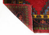 Vintage Turkish rug in a living room setting, pile rug, Turkish rug, vintage rug, portland, rug shop, bright colors, wild shaman, soft rug, bold color, Portland, Oregon, rug store, rug shop, local shop, antique rug