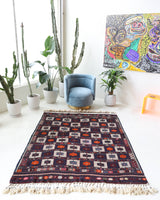 Vintage kilim rug in living room setting, bright colors, wild shaman, soft rug, bold color, Portland, Oregon, rug store, rug shop, local shop, vintage rug, modern kilim, warm colors, antique kilim rug