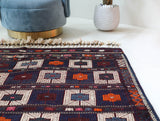Vintage kilim rug in living room setting, bright colors, wild shaman, soft rug, bold color, Portland, Oregon, rug store, rug shop, local shop, vintage rug, modern kilim, warm colors, antique kilim rug