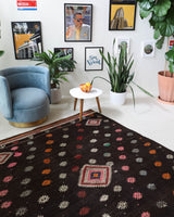 Vintage kilim rug in living room setting, bright colors, wild shaman, soft rug, bold color, Portland, Oregon, rug store, rug shop, local shop, vintage rug, modern kilim, warm colors