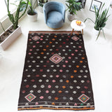 Vintage kilim rug in living room setting, bright colors, wild shaman, soft rug, bold color, Portland, Oregon, rug store, rug shop, local shop, vintage rug, modern kilim, warm colors