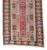 Vintage Turkish runner rug in living room setting, old rug, antique rug, pastel colors, faded colors, Turkish rug, vintage rug, soft rug, Portland, Oregon, rug store, rug shop, local shop