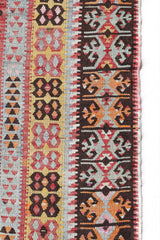 Vintage Turkish runner rug in living room setting, old rug, antique rug, pastel colors, faded colors, Turkish rug, vintage rug, soft rug, Portland, Oregon, rug store, rug shop, local shop