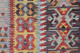 Vintage Turkish runner rug in living room setting, old rug, antique rug, pastel colors, faded colors, Turkish rug, vintage rug, soft rug, Portland, Oregon, rug store, rug shop, local shop