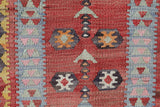 Vintage Turkish runner rug in living room setting, old rug, antique rug, pastel colors, faded colors, Turkish rug, vintage rug, soft rug, Portland, Oregon, rug store, rug shop, local shop