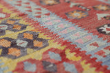 Vintage Turkish runner rug in living room setting, old rug, antique rug, pastel colors, faded colors, Turkish rug, vintage rug, soft rug, Portland, Oregon, rug store, rug shop, local shop