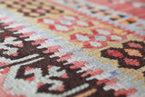 Vintage Turkish runner rug in living room setting, old rug, antique rug, pastel colors, faded colors, Turkish rug, vintage rug, soft rug, Portland, Oregon, rug store, rug shop, local shop