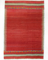 Vintage kilim rug in room decor setting, old rug, antique rug, pastel colors, faded colors, Turkish rug, vintage rug, soft rug, Portland, Oregon, rug store, rug shop, local shop, bold colors, bright colors, faded colors