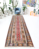 Vintage Turkish runner rug in living room setting, old rug, antique rug, pastel colors, faded colors, Turkish rug, vintage rug, soft rug, Portland, Oregon, rug store, rug shop, local shop