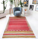 Vintage kilim rug in living room setting, old rug, antique rug, pastel colors, faded colors, Turkish rug, vintage rug, soft rug, Portland, Oregon, rug store, rug shop, local shop, earthy tones, earthy colors, warm colors