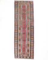Vintage Turkish runner rug in living room setting, old rug, antique rug, pastel colors, faded colors, Turkish rug, vintage rug, soft rug, Portland, Oregon, rug store, rug shop, local shop