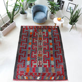 Vintage kilim rug in living room setting, bright colors, wild shaman, soft rug, bold color, Portland, Oregon, rug store, rug shop, local shop, vintage rug, modern kilim, warm colors