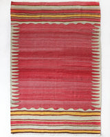 Vintage kilim rug in living room setting, old rug, antique rug, pastel colors, faded colors, Turkish rug, vintage rug, soft rug, Portland, Oregon, rug store, rug shop, local shop, earthy tones, earthy colors, warm colors