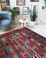 Vintage kilim rug in living room setting, bright colors, wild shaman, soft rug, bold color, Portland, Oregon, rug store, rug shop, local shop, vintage rug, modern kilim, warm colors