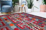 Vintage kilim rug in living room setting, bright colors, wild shaman, soft rug, bold color, Portland, Oregon, rug store, rug shop, local shop, vintage rug, modern kilim, warm colors
