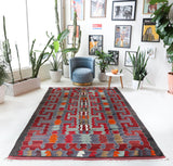 Vintage kilim rug in living room setting, bright colors, wild shaman, soft rug, bold color, Portland, Oregon, rug store, rug shop, local shop, vintage rug, modern kilim, warm colors