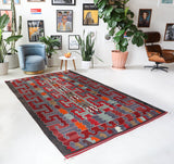Vintage kilim rug in living room setting, bright colors, wild shaman, soft rug, bold color, Portland, Oregon, rug store, rug shop, local shop, vintage rug, modern kilim, warm colors