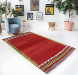 Vintage kilim rug in living room setting, bright colors, wild shaman, soft rug, bold color, Portland, Oregon, rug store, rug shop, local shop, vintage rug, modern kilim, warm colors