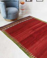 Vintage kilim rug in living room setting, bright colors, wild shaman, soft rug, bold color, Portland, Oregon, rug store, rug shop, local shop, vintage rug, modern kilim, warm colors