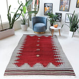 Vintage kilim rug in living room setting, bright colors, wild shaman, soft rug, bold color, Portland, Oregon, rug store, rug shop, local shop, vintage rug, modern kilim, warm colors