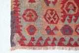 Vintage kilim rug in living room setting, old rug, antique rug, pastel colors, faded colors, Turkish rug, vintage rug, soft rug, Portland, Oregon, rug store, rug shop, local shop, earthy tones, earthy colors, warm colors