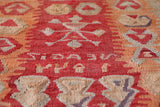Vintage kilim rug in living room setting, old rug, antique rug, pastel colors, faded colors, Turkish rug, vintage rug, soft rug, Portland, Oregon, rug store, rug shop, local shop, earthy tones, earthy colors, warm colors