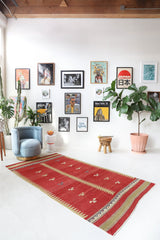 Vintage kilim rug in living room setting, old rug, antique rug, pastel colors, faded colors, Turkish rug, vintage rug, soft rug, Portland, Oregon, rug store, rug shop, local shop, earthy tones, earthy colors, warm colors