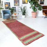Vintage Turkish runner rug in a living room setting, pile rug, Turkish rug, vintage rug, portland, rug shop, bright colors, wild shaman, soft rug, bold color, Portland, Oregon, rug store, rug shop, local shop, antique rug