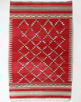 Vintage kilim rug in room decor setting, old rug, antique rug, pastel colors, faded colors, Turkish rug, vintage rug, soft rug, Portland, Oregon, rug store, rug shop, local shop, bold colors, bright colors, faded colors