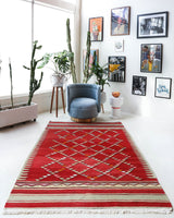 Vintage kilim rug in room decor setting, old rug, antique rug, pastel colors, faded colors, Turkish rug, vintage rug, soft rug, Portland, Oregon, rug store, rug shop, local shop, bold colors, bright colors, faded colors