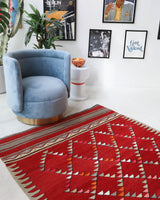 Vintage kilim rug in room decor setting, old rug, antique rug, pastel colors, faded colors, Turkish rug, vintage rug, soft rug, Portland, Oregon, rug store, rug shop, local shop, bold colors, bright colors, faded colors