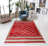 Vintage kilim rug in room decor setting, old rug, antique rug, pastel colors, faded colors, Turkish rug, vintage rug, soft rug, Portland, Oregon, rug store, rug shop, local shop, bold colors, bright colors, faded colors