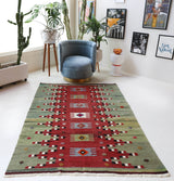 Vintage kilim rug in room decor setting, old rug, antique rug, pastel colors, faded colors, Turkish rug, vintage rug, soft rug, Portland, Oregon, rug store, rug shop, local shop, bold colors, bright colors, faded colors