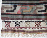 Vintage Turkish runner rug in living room setting, old rug, antique rug, pastel colors, faded colors, Turkish rug, vintage rug, soft rug, Portland, Oregon, rug store, rug shop, local shop