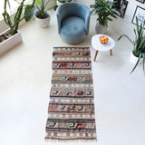 Vintage Turkish runner rug in living room setting, old rug, antique rug, pastel colors, faded colors, Turkish rug, vintage rug, soft rug, Portland, Oregon, rug store, rug shop, local shop