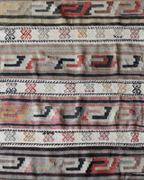 Vintage Turkish runner rug in living room setting, old rug, antique rug, pastel colors, faded colors, Turkish rug, vintage rug, soft rug, Portland, Oregon, rug store, rug shop, local shop