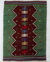 Vintage kilim rug in living room setting, bright colors, wild shaman, soft rug, bold color, Portland, Oregon, rug store, rug shop, local shop, vintage rug, modern kilim, warm colors