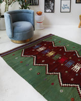 Vintage kilim rug in living room setting, bright colors, wild shaman, soft rug, bold color, Portland, Oregon, rug store, rug shop, local shop, vintage rug, modern kilim, warm colors