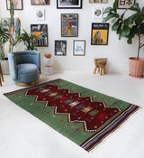 Vintage kilim rug in living room setting, bright colors, wild shaman, soft rug, bold color, Portland, Oregon, rug store, rug shop, local shop, vintage rug, modern kilim, warm colors