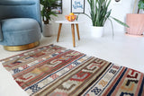 Vintage Turkish runner rug in living room setting, old rug, antique rug, pastel colors, faded colors, Turkish rug, vintage rug, soft rug, Portland, Oregon, rug store, rug shop, local shop