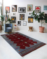 Vintage kilim rug in living room setting, bright colors, wild shaman, soft rug, bold color, Portland, Oregon, rug store, rug shop, local shop, vintage rug, modern kilim, warm colors